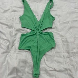Green body suit, size medium